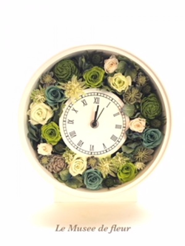 大人色の花時計、グリーンと白で作られましたサムネイル
